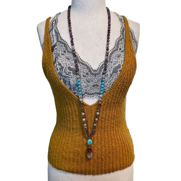 Free People  |||  rusty gold tank. You can wear the plunging side front or back. - Picture 7 of 10